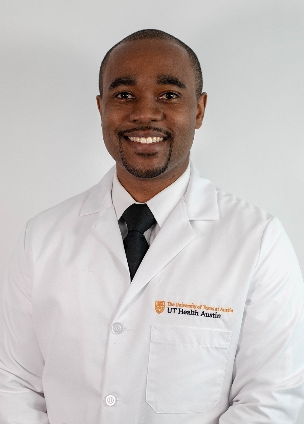 Headshot of Adewole Adamson.