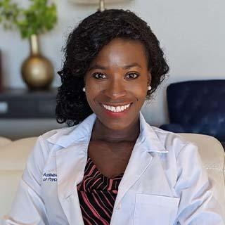 Headshot of Audrey Addaquay-Corey.