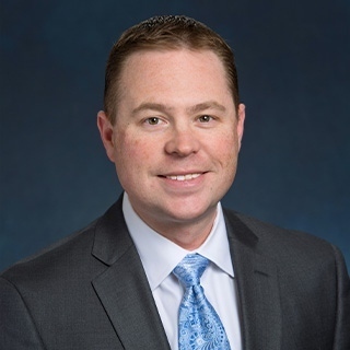 Headshot of Austin Hill.