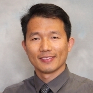 Jun Wang headshot.