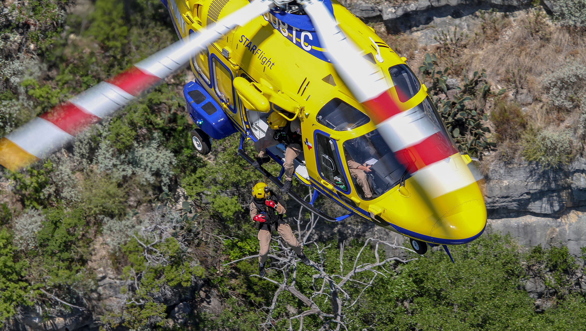 An EMS physician practicing a water rescue.