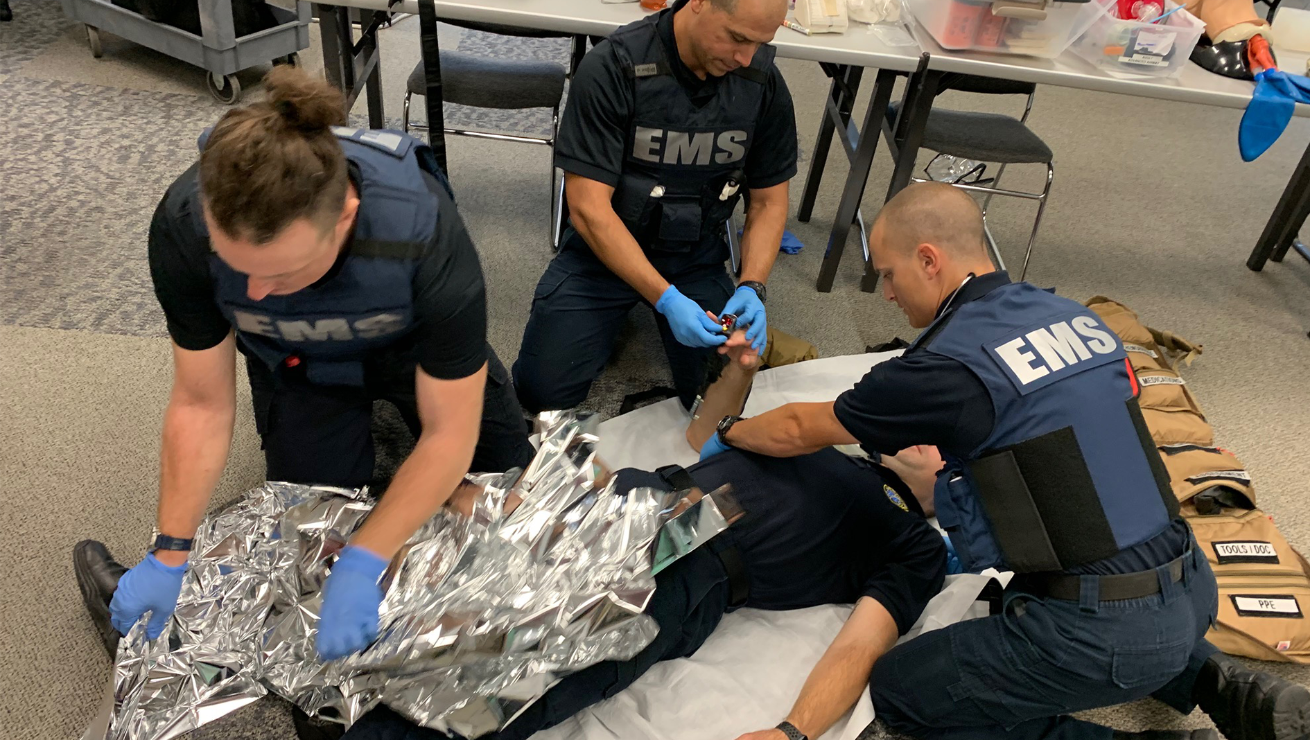 EMS physicians practicing an emergency scenario.