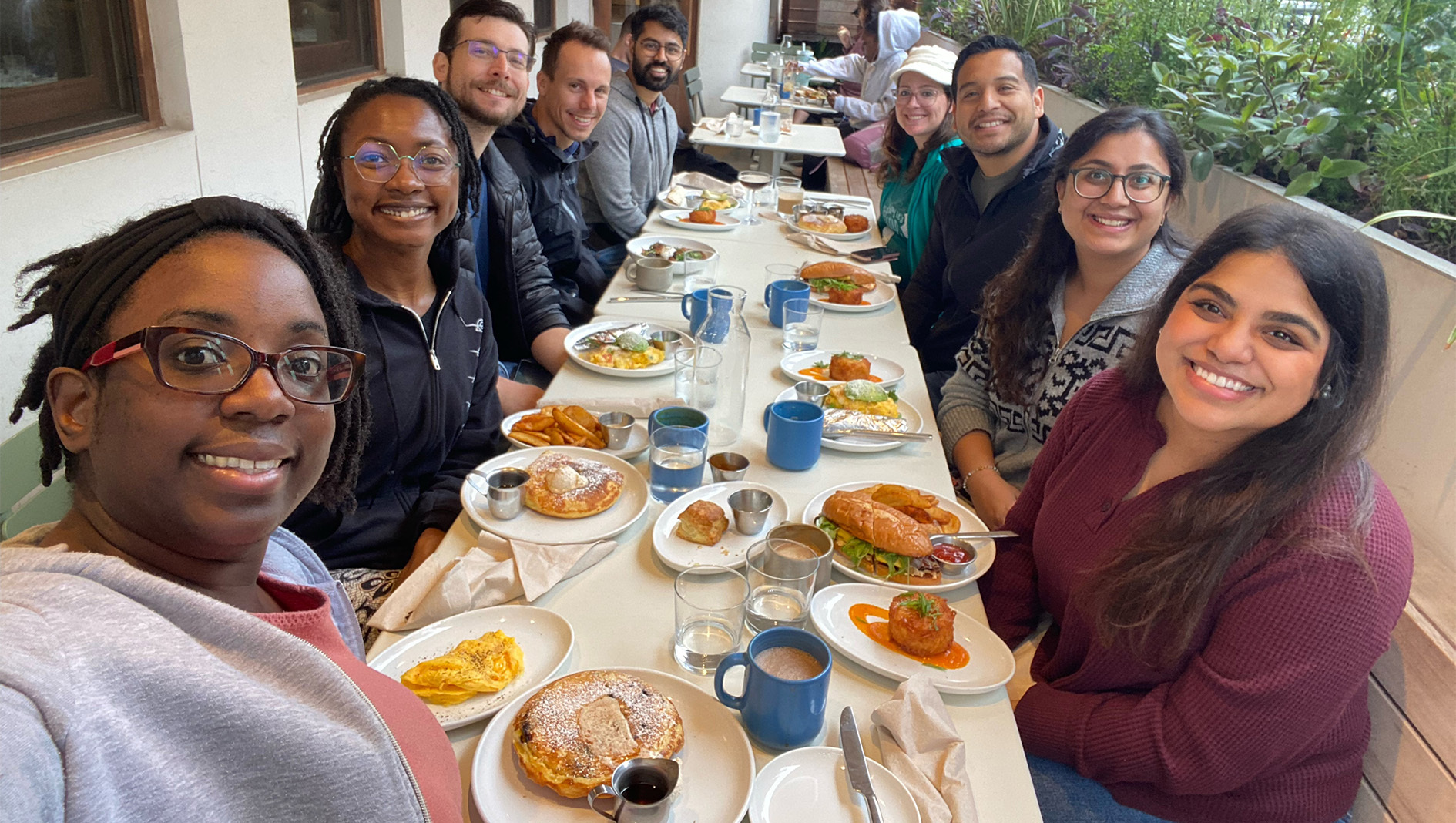 Members of the Neonatal-Perinatal Medicine Fellowship sit together for brunch.