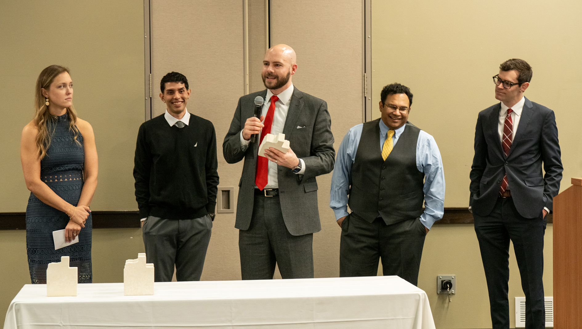 Group photo of the members of the Clinical Cardiac Electrophysiology Fellowship while speaking at graduation.