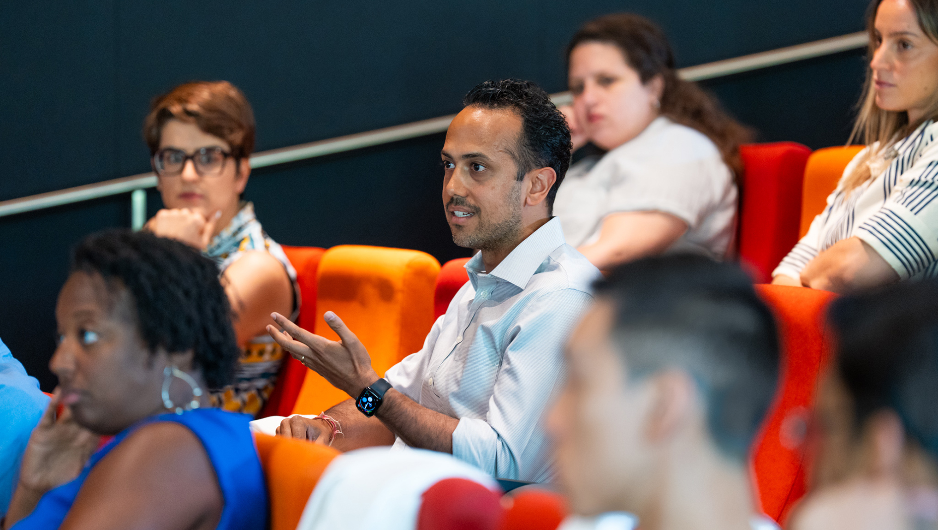 Gastroenterology fellows listen to a lecture.