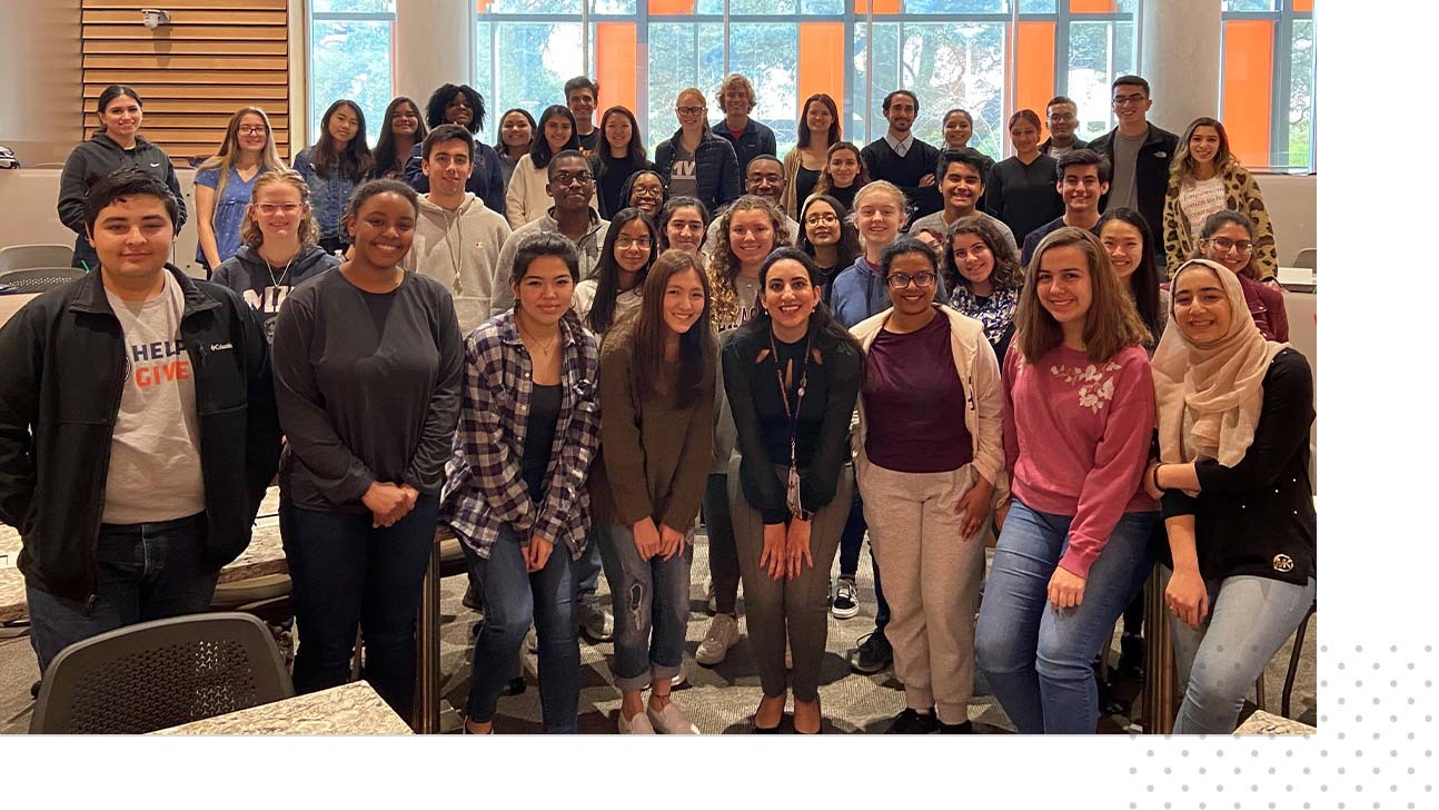 Members of the 2020 Health Sciences Yearlong Academy together in an auditorium at Dell Med.