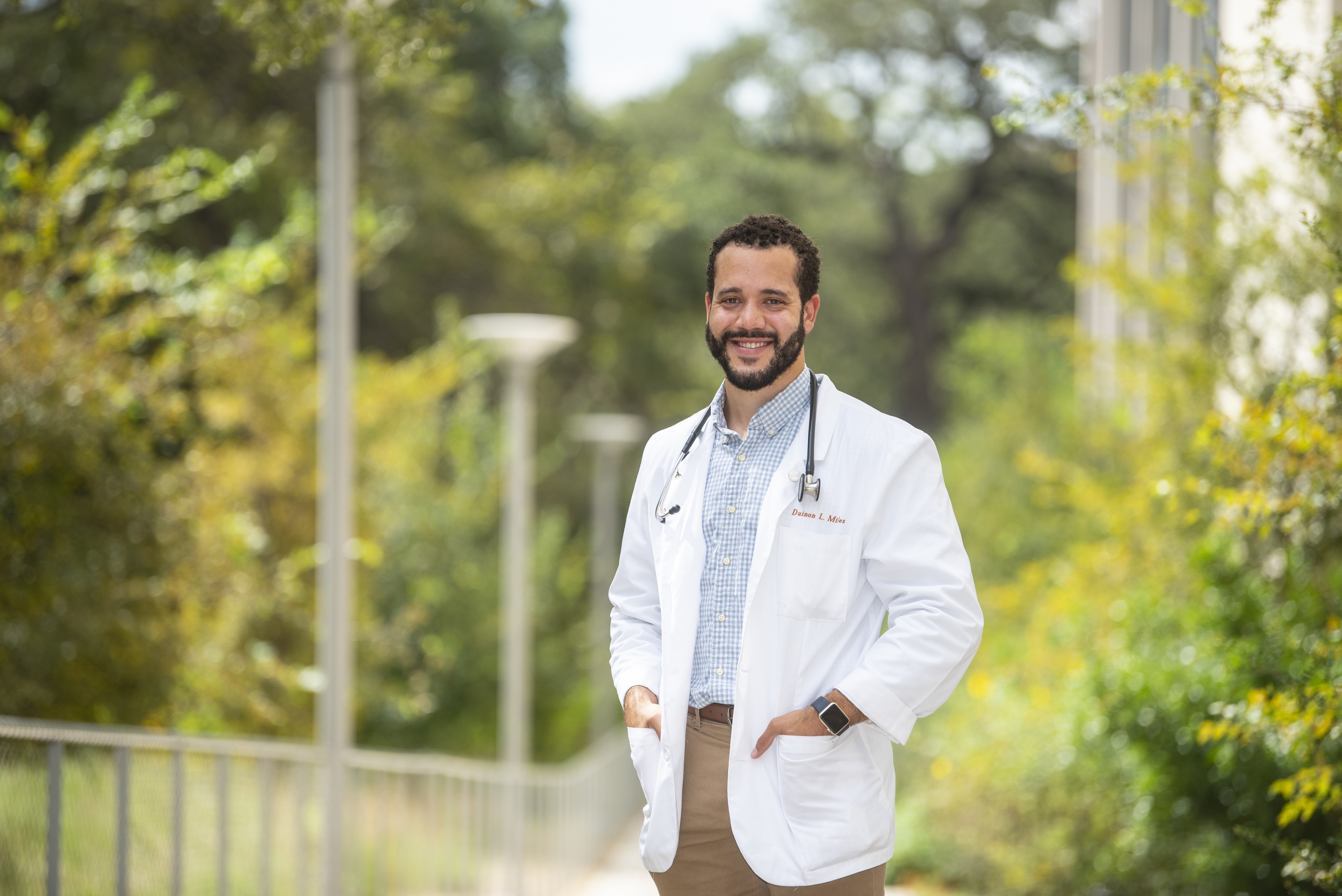 Dainon Miles smiling on the Dell Med campus.