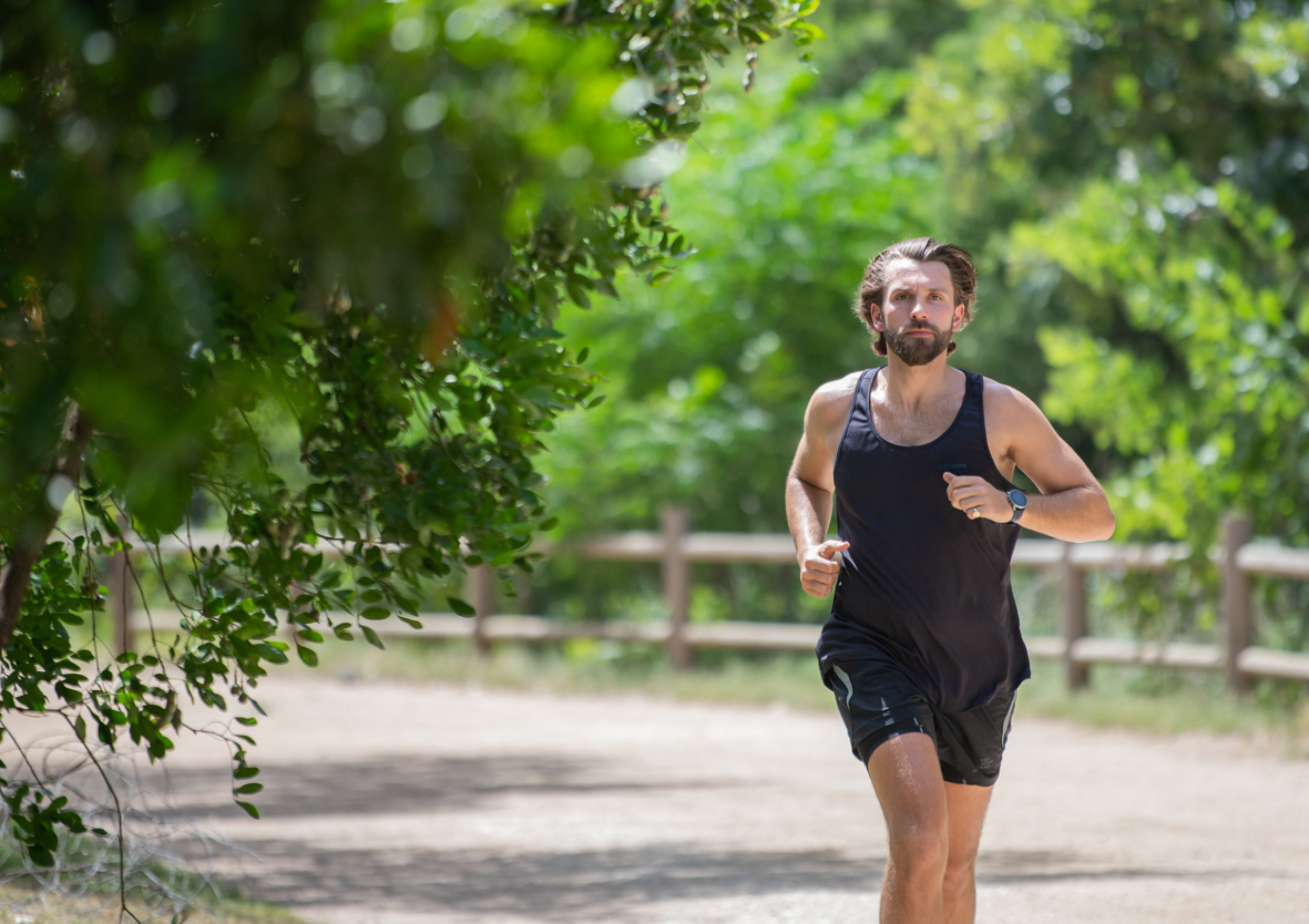 Josh Vintner-Jackson running on an outdoor trail.