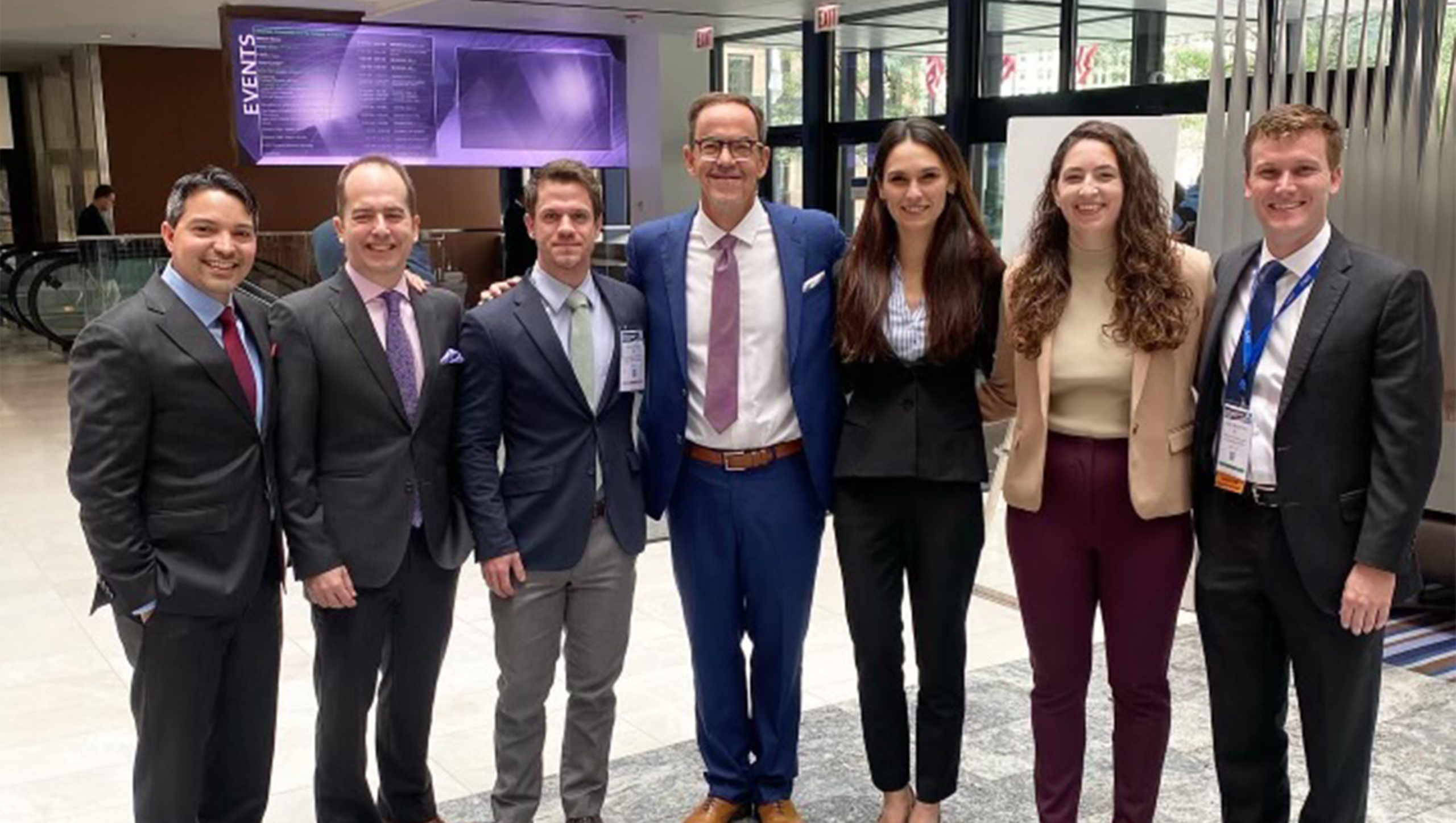 Faculty members and residents from Dell Med's General Surgery Residency stand together for a group photo at a conference in Chicago.