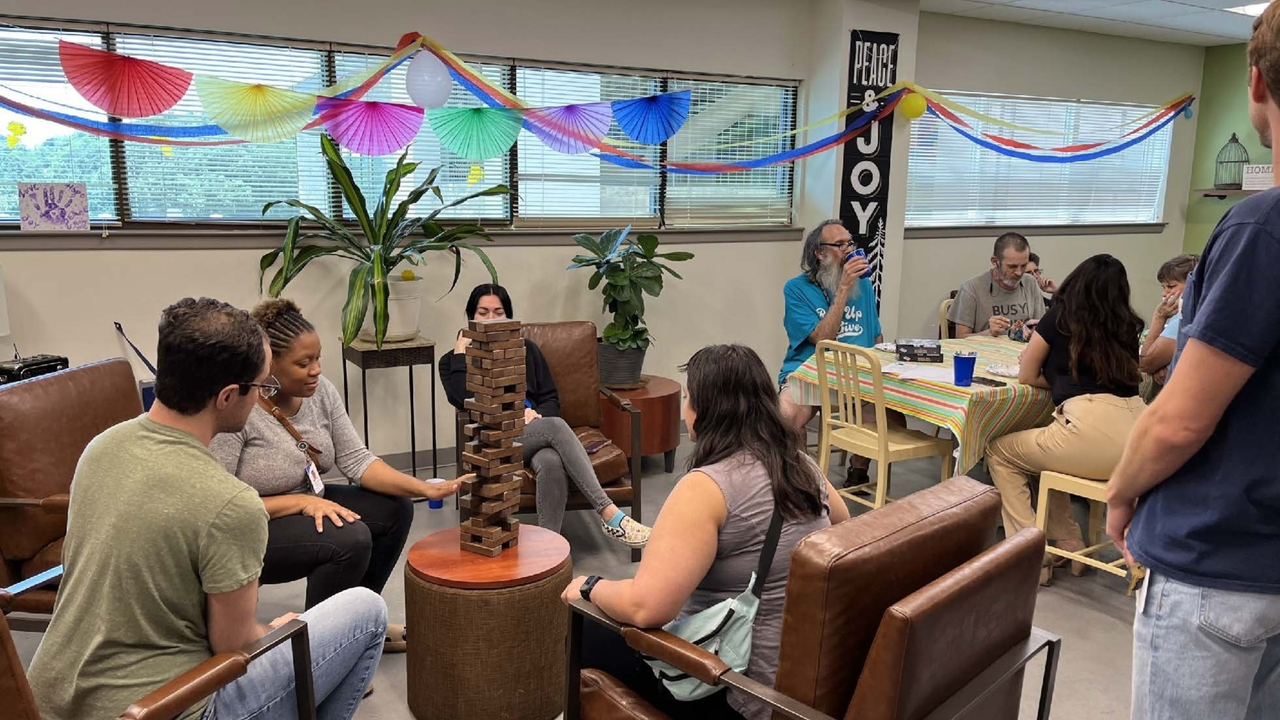 Residents and Integral Care staff gather at a Permanent Supportive Housing Unit. Photo courtesy Integral Care.
