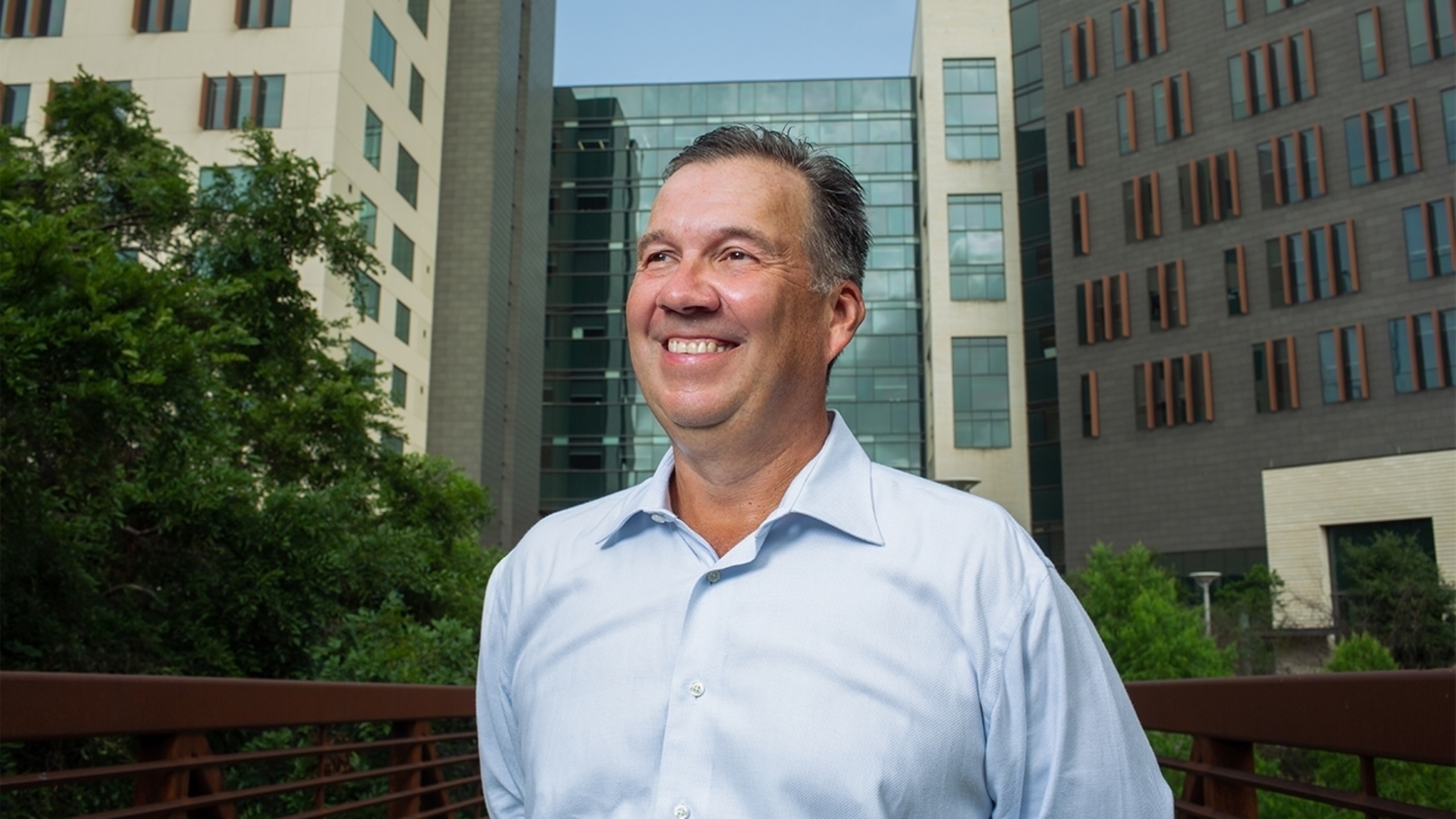 George Macones in front of Dell Medical School.
